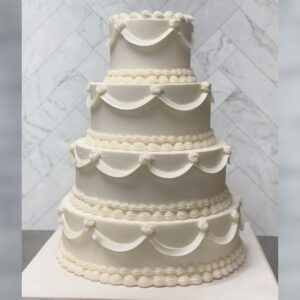 Drape & Mini Rosettes Wedding Cake