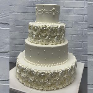 Rosette Pearl Drapes Wedding Cake