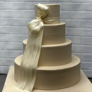 Satin Ivory Bow Wedding Cake