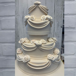 White Rosey Drapes Wedding Cake